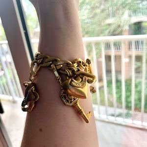 Juicy couture gold link bracelet with charms